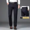 Pantalones casuales estilo Hong Kong con forro polar para hombre, corte recto holgado, pantalones de vestir de negocios, nuevo estilo 2026, pantalones de longitud media para hombres de mediana edad, adecuados para otoño e invierno