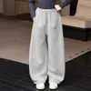 Pantalones de chándal para niña Primavera y Otoño 2026 Nuevos Casual Niña Estilo Coreano Niños Medianos y Grandes Letra Pierna Estrecha Pierna Ancha Pantalones de Punto