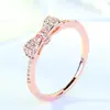 Suministro transfronterizo de joyería de moda europea y americana anillo de oro rosa anillo Joker de moda anillo de lazo microincrustado de circonita