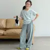 Camiseta de Manga Curta para Meninas de Verão, Novo Estilo para Crianças Maiores, Camiseta Casual de Três Botões para Meninas, Versátil e Estilosa