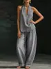 Terno Estilo Hong Kong Outono 2025 para Mulheres: Conjunto de Top Jeans com Gola Reversível e Decote Halter e Calça Jeans Casual Solta de Perna Larga