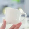 Xícara e Pires de Café Branco Puro Yuerui Xícara e Pires de Porcelana Branca Europeia Xícara para Chá da Tarde Xícara para Chá de Flores Xícara Britânica Hotel Logotipo Imprimível