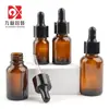 Botella de aceite esencial de 30 ml, botella secundaria nueva de 10 ml de vidrio marrón, botella con gotero de esencia de 15 ml, material de embalaje cosmético