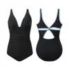 2026 Nuevo Traje de Baño Bikini de una Pieza Ajustado Sexy Estilo Europeo y Americano para Mujer, Traje de Baño Negro de Alta Gama, Al por Mayor en Stock
