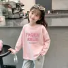 Camiseta de Manga Larga de Moda para Niña 2026 Primavera y Otoño Nueva Elegante Camiseta Infantil de Cuello Redondo Camiseta Básica de Algodón Puro para Niña Pequeña