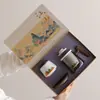 Taza de Té de Cristal Qianli Jiangshan Separación de Agua y Té Conferencia de Empresa Hotel Evento Festivo Souvenir Logotipo