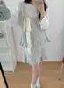Chal de Seda Diseño Chaleco de Punto Falda de Lana Conjunto de Dos Piezas 2025 Otoño e Invierno Nuevo Traje de Punto con Cortes para Mujer