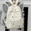 Mochila Escolar Transfronteiriça Feminina Ins Nicho Estudante do Ensino Fundamental Coração de Menina Laço Versátil Bonita Mochila Estudantil