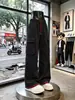 Pantalones de trabajo casuales con diseño multibolsillos en contraste negro y rojo para hombre, pantalones de pierna ancha rectos y holgados de tendencia street style con cordón