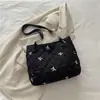Bolsa Nova Texturizada de Grande Capacidade Outono e Inverno 2025 Bolsa de Ombro Casual Moderna Personalizada Design de Nicho Bolsa Tote