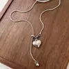 Collar Largo con Borlas Plateadas del Mismo Estilo que una Bloguera Coreana para Mujer, Cadena para Suéter de Tetera de Alta Gama Elegante y Versátil para Mujer