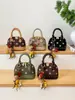 Bolso de mano tipo concha de moda transfronteriza fresco y dulce para mujer, nuevo de otoño 2026, bolso de hombro cruzado de lunares de lujo ligero