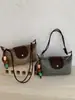 Bolsa Dumpling Super Tendência Color-Block de Verão para Mulheres, Novo Modelo 2026, Pequena Bolsa de Mão Transversal Trançada de Luxo de Nicho de Alta Qualidade