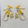 Novo Estilo Shuibei Ouro Imitação Fofo e Adorável Urso Manteiga Chaveiro Pingente de Celular Decoração de Bolsa