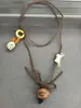 Nuevo collar colgante de oso y estrella con cuentas de madera, cadena para suéter de lujo ligero vintage de alta gama, accesorio elegante lindo y versátil