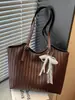 Bolso texturizado transfronterizo de moda 2026 nuevo bolso para mujer color liso tejido bolso de hombro bolso para el día a día bajo el brazo