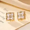 Pendientes retro franceses de flor de cuatro pétalos alta sensación moda temperamento pendientes naturales fritillaria pendientes de aguja de plata una generación de pelo