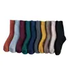 Calcetines de rizo para hombre y mujer calcetines de invierno de tubo grueso calcetines de lana de anillo calcetines de mujer color liso calcetines de toalla cálidos al por mayor