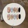 Yizhigu [Latte Azul Hielo] Flor Pequeña Maillard Ámbar Marrón Cálido Gradiente Ojo de Gato Uñas Portátiles Hechas a Mano