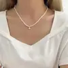 Collar de perlas de doble capa estilo retro francés para mujer, ligero, lujoso, de alta gama, con cadena para el cuello.
