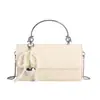 Bolso de Hombro Simple de Diseño de Nicho Verano 2025 Nuevo Color Puro Patrón Tejido Estilo Extranjero Bolso Pequeño Cuadrado para Viajar