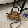 Bolso de mano vintage de nicho para mujer Otoño e Invierno 2026 nuevo modelo, mochila versátil para el día a día, mini mochila exquisita