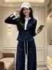Traje deportivo casual a la moda para mujer, estilo coreano de otoño, conjunto de dos piezas de top corto ajustado de alta gama y pantalones de pierna ancha