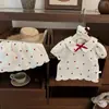 Conjunto de Ropa Coreana para Niña 2025 Nuevo de Moda Elegante Camisa de Muñeca de Manga Corta con Corazón con Falda Corta de Encaje Conjunto de Dos Piezas para Verano