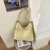 Bolsa de dumplings de gran capacidad para mujer, nuevo diseño de nicho vintage 2026, bolso de hombro cruzado, mochila multifuncional
