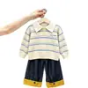 Ropa infantil estilo coreano 2026 colección otoño e invierno nueva: suéteres de punto y pantalones de pierna ancha con bloques de color elegantes y modernos para niños y niñas