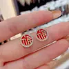 Pendientes Fu elegantes de color rojo de Año Nuevo, adecuados para pendientes de Año Nuevo, de color rojo brillante y redondos con diamantes, pendientes de estilo nacional de alta calidad.