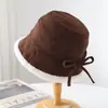 Al por mayor 25 Años Otoño e Invierno Nuevo Disparo Real Cálido Sombrero de Pescador para Mujer Gamuza Cachemir Retro Cálido Sombrero de Pescador