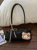 Nova Bolsa de Ombro Texturizada de Alta Qualidade para Outono/Inverno 2025, Simples e Estilosa para o Dia a Dia, Bolsa Baguete Papillon de Nicho