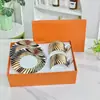 Taza y platillo de porcelana de hueso de alto valor y lujo ligero estilo europeo "Amor Hogar" con filo dorado, juego de regalo para oficina y hogar