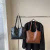 Transfronterizo Nuevo Al Por Mayor Casual Simple Retro Gran Capacidad 2025 Cara Suave Bolso Tote de Hombro Axila para Viaje de Negocios para Mujeres