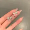 Estilo de chica dulce coreana~ Pendientes de lazo de encaje con circonita, lindos y exquisitos, pendientes de estilo dama elegante, accesorios para las orejas únicos y elegantes
