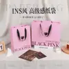 Bolsa de mano simple de cartón blanco, hecha a medida para ropa y regalos, impresión publicitaria universal, logotipo, personalización al por mayor de fábrica