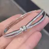 Pulsera Entrelazada de Doble Anillo Conexión París Francesa para Mujer Pulsera Nudosa Full Diamond Chapada en Oro Rosa 18K Joyería de Mano de Alta Gama