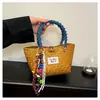 Bolsa de Palha Tecida Artesanal de Verão para Mulheres 2025 Nova Versátil Estilo Pastoral Bolsa de Mão Estilo Férias na Praia Bolsa de Palha