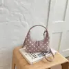 Exquisito y moderno minibolso, nueva colección 2026, bolso cruzado versátil para mujer, bolso tote único de lunares, bolso con forma de cuerno