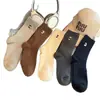 Calcetines de Mujer para Otoño e Invierno con Estampado Metálico Letra X Pequeña Sensación de Alta Gama Calcetas de Media Pierna Color Sólido Calcetas Apilables Tendencia ins Calcetas Largas Adelgazantes
