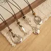 Nueva colección otoño/invierno: Collar colgante lágrima de piedra ojo de tigre color café, un accesorio de cadena larga delicado y lujoso para suéteres