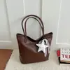 Elegante bolso de mujer 2026 nuevo modelo, gran capacidad, adecuado para el trabajo y los desplazamientos, bolso tote tejido de alta gama a la moda, moderno