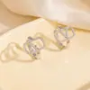 Estilo influencer lujo ligero exquisito moderno retro diamante brillante V-shaped ear cuff de alta gama diseño de nicho aretes de temperamento versátiles