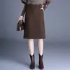 Saia Midi Elegante de Pelúcia Camurçada Justa ao Corpo para Mulheres Outono/Inverno 2026 Nova Saia Midi de Cintura Alta Cobrindo os Quadris Saia Reta Elegante para o Trabalho