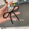 Corea del Sur Dongdaemun Bolso de Perlas con Lazo Llavero Colgante Accesorios para AirPods Colgante de Amor Sentido de Alta Calidad
