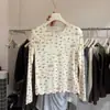 Nova coleção de outono de Dongdaemun, Coreia: Camiseta longa de manga comprida, estilo coreano, suave, com babados e estampa floral para mulheres, perfeita para usar em camadas como uma blusa de baixo