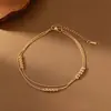 Novo Modelo 2025 Tornozeleira Dongguan de Aço Titânio para Mulheres, Toque de Luxo Leve e de Alta Qualidade, Aço Inoxidável Banhado a Ouro 18K, Tornozeleira Feminina que Não Desbota