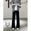 Otoño 2026 Pantalones Vaqueros Occidentales de Color Sólido de Alta Calidad para Hombre Estilo Retro Americano Sencillos Adelgazantes que Alargan las Piernas Micro-Campana de Moda