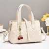 Bolso de mano moderno para mujer para el trabajo, nuevo bolso pequeño de moda versátil con patrón de diamantes, estilo de lujo ligero, para llevar al hombro y cruzado para mujer